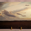 Cloudscape photograph on double weight matboard